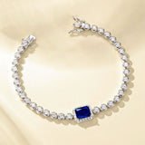 FANCIME "Axis" Radiant Cut September Birthstone Sapphire Sterling Silver Tennis Bracelet