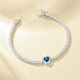 FANCIME "Axis" Heart Cut December Birthstone Topaz Sterling Silver Tennis Bracelet