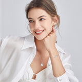 "Infinite Embrace" June Birthstone White Pearl Infinity Symbol Sterling Silver Pendant Necklace - Silver