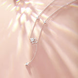 "Starlit Melody" Dangling Star Sterling Silver Drop Necklace