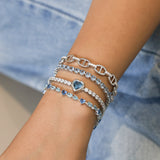 FANCIME "Axis" Heart Cut December Birthstone Topaz Sterling Silver Tennis Bracelet